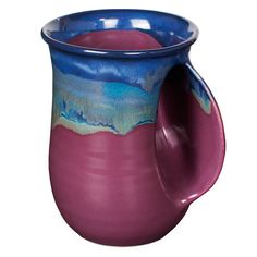 a purple and blue ceramic mug with handle