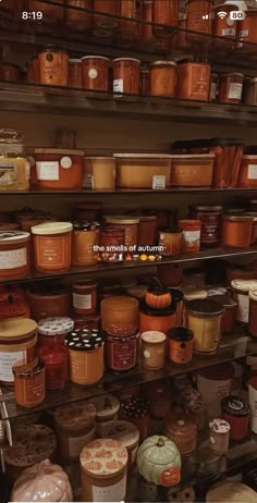 shelves filled with lots of different types of jars and containers on top of each other