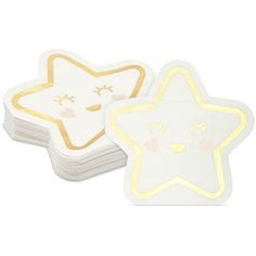 two white and yellow stars shaped coasters on top of each other, one with a face