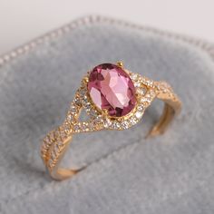 "14k Solid Gold Oval Cut Pink Tourmaline Ring, Halo Moissanite Engagement Ring,October Birthstone,Pink Gemstone Ring,Unique Wedding Ring,Love ★ ★ ★ ★  CUSTOM/DUTY-FREE SHIPPING WORLDWIDE, BUYERS DON'T HAVE TO PAY ANY CUSTOM FEES WHILE IMPORTING ★ ★ ★ ★  Details Material: 14k/18k gold Color Options: Yellow Gold, White Gold, Rose Gold ★ Stone  Pink Tourmaline, Oval Size: 6 mm * 8 mm  Approx Weight (Ct): 1.09 Diamond Round Size: 1.1 mm * 58 Approx Weight (Ct): 0.348 ★ 100% Natural Diamond and Gemstones ★ Diamond: Round Brilliant cut, G-H Color, SI Clarity ☂ Shipped with Insured Shipping within 4-7 business days. ➦ 100% Free Returns. ➦ Our Jewelry comes with a Lifetime Warranty. (Stone Replacement not included) ✈ We offer free EXPRESS shipping across the world. ★ We can also provide a certific Elegant Pink Tourmaline Birthstone Ring, Pink Oval Diamond Ring With Accent Stones, Oval Pink Diamond Ring With Accent Stones, Pink Sapphire Birthstone Wedding Ring, Pink Sapphire Wedding Ring Birthstone, Rose Gold Tourmaline Wedding Ring, Pink Gold Sapphire Wedding Ring, Oval Pink Gold Ruby Ring For Wedding, Fine Jewelry Pink Topaz Wedding Ring