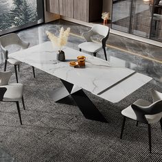 a marble table with chairs around it