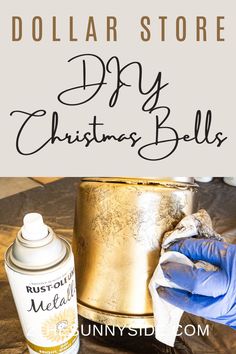 dollar store diy christmas bells with gold tinsel and gloves on the table next to it