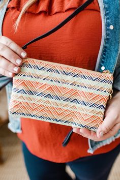 Your favorite clutch is in a whole new pattern and material for summer! So many pockets and room to hold all of your essentials! It has a zip closure, detachable wrist or shoulder strap that can be worn on the shoulder or crossbody, and supple faux leather. The gorgeous strawberry, mint, navy, andnatural colors are amazingly woven together in a fun pattern. Measurements Measurements: 9" long x 5” tall x 1.5” deep Shipping Free standard shipping on all orders of $150 or more! Free In-store Pick-u Casual Clutch With Zipper Pouch, Casual Everyday Clutch With Zipper Pouch, Summer Clutch With Removable Pouch For Everyday, Trendy Clutch With Zipper Closure For Travel, Summer Everyday Crossbody Clutch, Trendy Clutch With Zipper Closure For On-the-go, Trendy Travel Clutch With Zipper Closure, Trendy On-the-go Clutch With Zipper Closure, Summer Travel Clutch Pouch