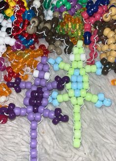 many beads are laid out on the floor