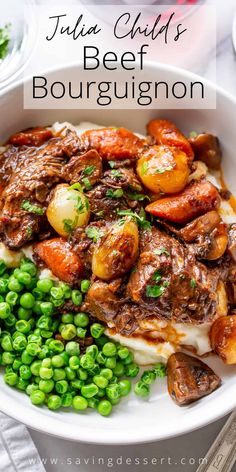 a white bowl filled with meat and vegetables on top of a table next to green peas