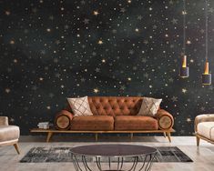 a living room filled with furniture and stars on the wall behind it is a brown couch