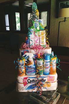 a large stack of diapers and bottles on a table