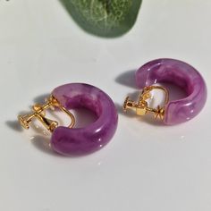 These minimalist lightweight, purple screw back clip-on hoop earrings are simple yet perfect huggie hoop for your everyday look. SIZE:2.3 cm Purple Clip-on Earrings, Purple Hoop Earrings For Pierced Ears, Purple Small Hoop Earrings For Pierced Ears, Small Purple Hoop Earrings For Pierced Ears, Hypoallergenic Purple Hoop Earrings, Piercing Earrings, Huggie Earrings, Delicate Earrings, Large Earrings