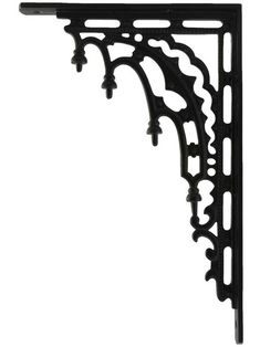 an ornate black shelf bracket on a white background