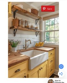 a kitchen with yellow cabinets and open shelves above the sink is featured on instagram