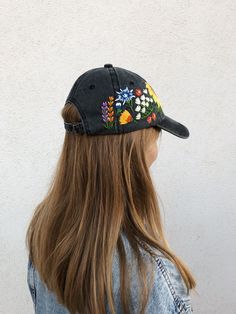 Hand Embroidered Hat is the best gift for her! 🌿 PLEASE NOTE THIS HAT IS READY TO SHIP🌿 Color: a black baseball cap. Design: hand embroidered echinacea with wildflowers. Cap size (head circumference): 55 - 62 cm. GET 10% OFF YOUR 1ST ORDER! Get a 10% off coupon code for our Etsy shop by signing up to our mailing list eepurl.com/gefZy5 CHECK OUR OTHER ACCESSORIES 🌸More Baseball hats: https://www.etsy.com/shop/KazkovaEmbroidery?ref=seller-platform-mcnav&section_id=25392998 🌿Kids Baseball h Embroidered Adjustable Trucker Hat, Embroidered Snapback Hat As Gift, Embroidered Snapback Hat As A Gift, Embroidered Cotton Hat As Gift, Embroidered Baseball Cap Gift, Embroidered Black Hats As Gifts, Adjustable Cap With Multicolor Embroidery, Embroidered Curved Brim Baseball Cap As Gift, Embroidered Baseball Cap One Size