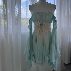 Pls Send Measurements To Reference If Interested! Fits Around A Size Small This Piece Was Custom Made For Me. The Corset Had To Be Adjusted To Fit Properly, In The Pics On The Front There’s A Very Imperfection In The Bust Area W The Silk. I Wear This Dress Only Once In The Maldives It Doesn’t Fit Me Anymore And I Hope It Can Find A New Home With Someone That Will Appreciate It As Much As I Did Ps Apologies I Do Not Have A Steamer Atm So This Dress So It’s A Bit Wrinkled Fitted Vintage Fairy Dress For Spring, Fitted Long Sleeve Fairy Dress For Summer, Light Blue Bohemian Dress For Wedding, Light Blue Bohemian Wedding Dress, Light Blue Bohemian Dress With Lace Trim, Fitted Light Blue Dress With Lace Trim, Bohemian Fitted Corset Dress For Spring, Fitted Bohemian Corset Dress For Spring, Fitted Bohemian Light Blue Mini Dress