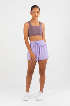 Slow it down and hit reset with the Snuggle Rib Loose-Fit Short in Lavender. The ballet-core loungewear essential is here to help you rest in style. This short features a relaxed A-line fit, styled with a flitty frilled hemline. It’s snuggly and cosy yet lightweight and breezy. A perfect summer loungewear addition. Stretch Activewear For Lounging In Short Length, Stretch Activewear For Lounging, Sporty Summer Activewear For Relaxation, Casual Sleeveless Activewear For Relaxation, Sporty Short Activewear For Relaxation, Spring Athleisure Shorts For Relaxation, Short Length Stretch Activewear For Relaxation, Sporty Activewear With Elastic Waistband For Relaxation, Seamless Athleisure Shorts For Loungewear