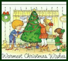 children decorating a christmas tree with the words warmest christmas wishes