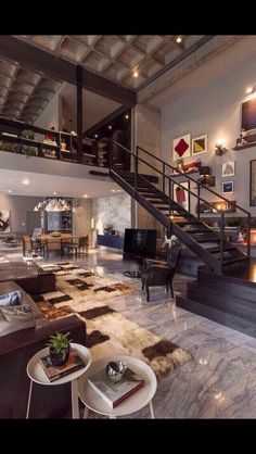 a living room filled with lots of furniture and decor