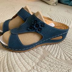 Navy Blue, Brand New, With Flower Decoration. Very Cute, A Great Addition To Your Shoe Collection! European Size 40. About 3” Heel. Comfortable Blue Sandals For Spring, Casual Blue Wedge Sandals For Spring, Casual Blue Spring Wedge Sandals, Ladies Sandals, Beautiful Ladies, Shoe Collection, Flower Decorations, Women's Shoes Sandals, Womens Sandals