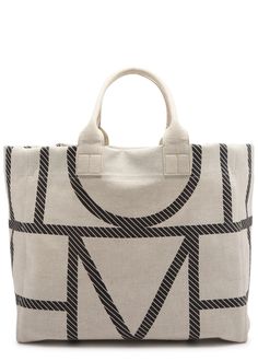 Find TOTÊME Logo-monogrammed Canvas Tote on Editorialist. The Toteme canvas tote features two top handles and a monogrammed logo print. It includes an internal patch pocket and is fully lined. The tote has an open top. The dimensions are: Width: 22.5 inches/ 57cm; 16.5 inches/ 42cm; Height: 14.5 inches/ 37cm; Depth: 8 inches/ 20.5cm; Top handle drop: 7.5 inches/ 19cm. Travel Canvas, Tool Gifts, Monogram Logo, Open Top, Monogram Canvas, Womens Tote Bags, Logo Print, Canvas Tote, Patch Pocket