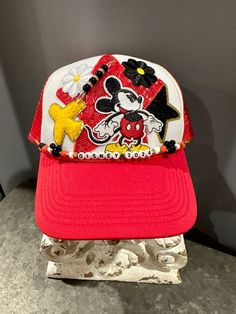 Perfect for the Disney enthusiasts. Stabd out in the crowd with your one of a kind custom trucker hst. Disney Trucker Hat, Mickey Mouse Design, Disney 2024, Antique Booth, Hat Stand, Custom Trucker Hats, Disney Patches, A Pony, Hat Patches