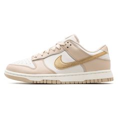 The Nike Dunk Low “Phantom Metallic Gold” is a luxurious and eye-catching rendition of the iconic silhouette, offering a blend of subtlety and opulence. This sneaker features a sophisticated ‘Phantom’ base color, a muted off-white that provides a perfect canvas for the striking ‘Metallic Gold’ accents. These gold highlights adorn the swoosh, heel tab, and [...] Teen Doctor, Tenis Nike, Nike Gold, Gold Sneakers, Dunks Nike, Gold Highlights, Girly Shoes, Nike Dunk Low, Dunk Low