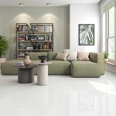 a living room filled with furniture and bookshelves