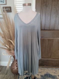 Swing dress with pockets Imported. Umgee Green V-neck Tunic For Fall, Oversized Gray V-neck Dress, Casual Tunic Dress For Fall, Casual Flowy Gray Dress, Solid Long Dress For Loungewear, Gray Dress For Loungewear In Fall, Gray Loungewear Dress For Fall, Gray Dress For Fall Loungewear, Gray Fall Loungewear Dress