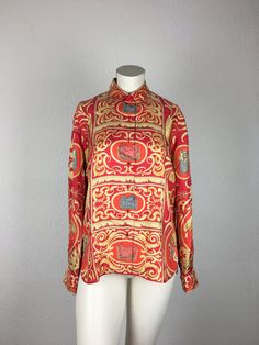 An extraordinary & rare find! Original vintage blouse from HERMES - PARIS red gold/yellow patterned Size - dimensions approximately L/Large: Shoulder width: 40 cm / 15.6 inch Chest circumference: 100 cm / 39.4 inch Waist circumference: 99 cm / 39.0 inch Length: 66 cm / 26.0 inches outstanding condition! buttoned at the front hidden button on the collar Material: 100% silk Sizes according to https://www.sizechart.com/clothing/women/european/index.html Measured at the widest part of the chest (arm Luxury Silk Printed Blouse, Designer Formal Printed Tops, Luxury Printed Silk Tops, Luxury Printed Tops For Formal Occasions, Designer Printed Tops For Formal Occasions, Designer Long Sleeve Yellow Tops, Silk Long Sleeve Top With Baroque Print, Luxury Multicolor Silk Tops, Formal Silk Printed Shirt