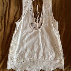 Free People Mini Dress Color: White/Cream Size: Medium Condition: Never Worn Has Pockets White Cotton Beachy Dress, White Beachy Cotton Dress, Beachy White V-neck Top, White Sleeveless Beachy Top, Bohemian Off-white Top For Beach, Off White Bohemian Top For The Beach, Bohemian Off White Top For Beach, White Beachy Top For Brunch, White Bohemian Top For Daytime