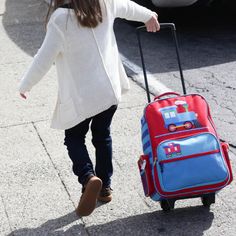 Wildkin's Rolling Suitcase is the perfect travel accessory! Measuring 16 x 11.5 x 6 inches, this suitcase makes a great carry-on. Its roomy design easily fits everything your child needs, while being lightweight enough to ensure that they dont get weighed down. The Rolling Suitcases spacious interior means your child can pack more than just the bare necessities! Whether theyre packing books and toys for a fun-filled outing, or pajamas and their favorite teddy bear for sleepover, this suitcase st Playful Rectangular Luggage For Travel, Playful Rectangular Travel Luggage, Educational Rectangular Backpack For Travel, Playful Multicolor Travel Luggage, Playful Luggage For Back To School, Playful School Luggage For Back To School, Playful Back To School Luggage, Playful Multicolor School Luggage, Packing Books