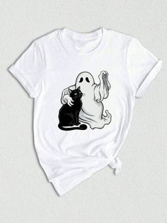 Get into the spirit of the season with our Fall Vibes T-shirt! This fall tshirt is perfect for all Halloween and spooky season enthusiasts. Featuring a unique design that combines a vintage ghost and a playful Halloween cat, this shirt is a must-have for cat lovers and owners alike.  Made from high-quality materials, our Halloween shirt ensures superior comfort and durability. The soft fabric feels gentle against your skin, ensuring a cozy fit all day long. Whether you're attending a Halloween p White T-shirt With Cat Print For Fall, Short Sleeve T-shirt With Cat Print For Halloween, Spooky Black T-shirt With Cat Print, Spooky Cat Print Crew Neck T-shirt, White Cat Print T-shirt For Halloween, Halloween Black T-shirt With Cat Design, Black Halloween T-shirt With Cat Design, Halloween Graphic Tee With Cat Design, Halloween Cat Print Graphic Tee