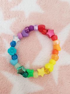 Cute rainbow bracelet with random beads Rainbow Kandi, Bracelets Kandi, Kandi Bracelets, Rainbow Bracelet, Cute Rainbow, I Missed, Arm Band, Halloween Shopping, Seed Beads