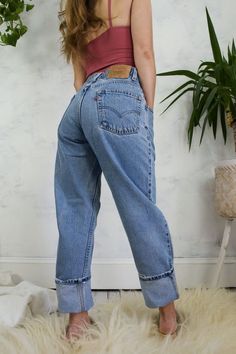 Vintage 90's jeans. Levi's 550 red tab. High rise with a relaxed fit. Distressed denim with a few small holes throughout. Zip fly. ---------------------------- details circa | 1990's label | levi strauss material | 100% cotton ---------------------------- measurements size | 30 x 30 fits like | 29 x 30 waist | 29 inches rise | 11 inches inseam | 30 inches ---------------------------- condition very good + a few holes throughout (see close up images for details) Levis 501 Outfit Street Style, Mom Jeans Outfit, Vintage Levis Jeans, Levi Jeans Women, High Rise Mom Jeans, Straight Fit Jeans, Jeans Outfit, Button Fly Jeans, Straight Leg Denim