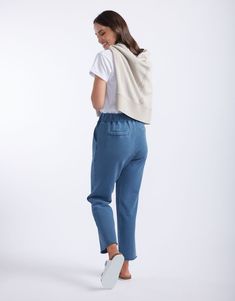 DESCRIPTION Elevate your casual wear with the Raw Edge Lounge Pant in Denim by White & Co. The Label. These lounge pants are designed for ultimate comfort and style, featuring a relaxed fit with a drawstring waist and raw edge hem. The soft denim colour adds a modern touch, while the large front pockets provide both practicality and a chic look. Perfect for lounging at home or running errands, these French Terry pants will become your go-to for effortless, laid-back style. Pair the Raw Edge Loun Everyday Relaxed Fit Drawstring Pants, Relaxed Drawstring Pants For Everyday, Comfortable Straight Leg Bottoms With Drawstring, Dark Wash Relaxed Fit Bottoms For Casual Gatherings, Relaxed Fit Dark Wash Bottoms For Casual Gatherings, Denim Blue Drawstring Straight Leg Bottoms, Comfortable Straight Leg Bottoms For Elevated Casual, Sporty Mid-rise Cotton Sweatpants, Washed Blue Cotton Bottoms For Loungewear