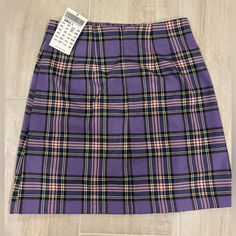 New With Tags, Flattering And Comfortable Purple Fitted Mini Skirt For School, Purple Pleated Mini Skirt For School, Purple Skort For School, Trendy Purple Cotton Skirt, Trendy Fitted Purple Skort, Purple Casual Skort For School, Fitted Purple Trendy Skort, Trendy Purple Lined Mini Skirt, Purple Pleated Skirted Skort