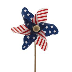 a red, white and blue pinwheel on a stick