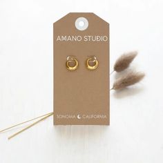 These "one touch" snap on huggie hoops are available in 15mm (small) and 20mm (medium). They are an easy, vintage look that stacks well with other pieces or they have a sleek modern look all on their own. Made of 14k gold plated brass (nickel free). Everyday Nickel-free Small Hoop Huggie Earrings, Nickel-free Small Hoop Huggie Earrings For Everyday, Nickel Free Small Hoop Huggie Earrings For Everyday, Adjustable Small Hoop Modern Huggie Earrings, Adjustable Modern Small Hoop Huggie Earrings, Minimalist Everyday Brass Huggie Earrings, Everyday Minimalist Brass Huggie Earrings, Everyday Gold Huggie Cartilage Earrings, Gold Huggie Cartilage Earrings For Everyday