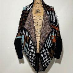 Absolutely Gorgeous - This Is Like A Bundle Of Hugs Mew Aztec Print Open Cardigan Multicolor Shrug Black Ribbed Knit Sleeves Detail Super Soft & Cozy Boho - Bohemian Style Eyelash Fabric Pristine Condition 30” Pit-Pit 35” Length Fall Patchwork Sweater For Cold Weather, Multicolor Jacquard Knit Winter Outerwear, Cozy Jacquard Knit Winter Outerwear, Cozy Jacquard Knit Outerwear For Cold Weather, One-size Patchwork Sweater For Fall, Jacquard Knit Outerwear For Layering, Fall Patchwork Sweater One Size, Multicolor Jacquard Knit Winter Cardigan, Winter Orange Patchwork Outerwear