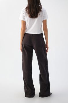 Our take on the utility pant: Sitting low on the hip with a dropped crotch, you'll love the comfortable, relaxed fit. They feature a wide, stacked leg and classic workwear inspired cargo patch pockets. Zip fly. This style is garment dyed, which adds a dimension of color, giving new pieces the feel of vintage. WASH: VINTAGE BLACK FIT & MEASUREMENTS: Inseam = 32" Front Rise = 11" Back Rise = 15 1/4" Leg Opening = 21 1/2" Measurements taken from size 27 Gizele is wearing size 25 and is 5"9" Fabric & Care: 78% Cotton, 29% Lyocell, 1% Elastane Machine wash cold, and either hang dry or tumble dry low heat Made with love in Los Angeles Relaxed Fit Utility Cargo Bottoms, Relaxed Fit Cargo Style Utility Bottoms, Elevated Casual Cotton Jeans With Cargo Pockets, Utility Cargo Bottoms With Relaxed Fit, Washed Black Straight Leg Pants With Cargo Pockets, Straight Leg Washed Black Pants With Cargo Pockets, Straight Leg Washed Black Cargo Pants, Washed Black Straight Leg Cargo Pants With Side Pockets, Urban Style Washed Black Relaxed Fit Cargo Pants