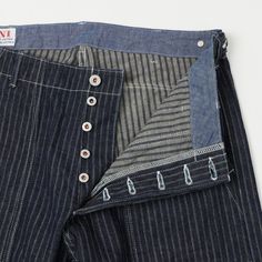 ONI’s new stripe fabric is the result of meticulous experimentation with a ‘drop needle’ technique, which causes these beautiful lines in the fabric without losing strength or integrity. On the lighter side of the scale for the brand, this denim weighs in at just 12 ounces, and boasts a loose weave which makes this fabric incredibly supple and easy to wear. This traditional wide-leg ‘baker pant’ style draws influence from the early days of American workwear, with simple pocket construction, and Vintage Wide Leg Jeans, American Workwear, Chambray Fabric, Stripe Fabric, Japanese Denim, Heritage Fashion, Beautiful Lines, Pinterest Outfits, Final Touch