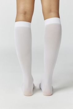 Essential knee highs in the softest sheer knit. Content + Care 96% Nylon, 4% spandex Hand wash Imported Size + Fit Knee length | Classic Sheer Knee High Sock in White, Women's at Urban Outfitters Fitted Solid Color Knee-high Socks, Soft Knee-high Socks For Stocking Stuffers, Classic Stretch Knee-high Legwear, Classic Knee-high Fitted Stockings, Classic Solid Color Knee-high Legwear, Classic Fitted Knee-high Stockings, White Fitted Over The Knee Socks, Fitted White Over-the-knee Socks, White Fitted Over-the-knee Socks