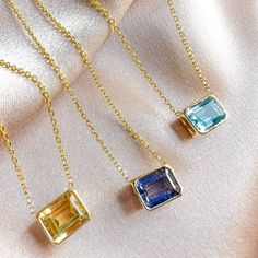 Beautiful collection East and West emerald cut Necklace. Handcrafted in New York. 14K Yellow Gold Yellow Citrine 8x6mm 1.75Ct Blue Topaz 8x6mm 1.75Ct Iolite 8x6mm 1.75Ct 18" Long adjustable to 16" Emerald Cut Sapphire Gemstone Necklace, Fine Jewelry Sapphire With Rectangular Stone, Sapphire Gemstone Necklace In Rectangular Shape, Emerald Cut Tanzanite Jewelry In Yellow Gold, Sapphire Gemstone Rectangular Necklace, Rectangular Sapphire Gemstone Necklace, Radiant Cut Tanzanite Jewelry Gift, Sapphire Baguette Cut Gemstone Jewelry, Sapphire Baguette Cut Birthstone Jewelry