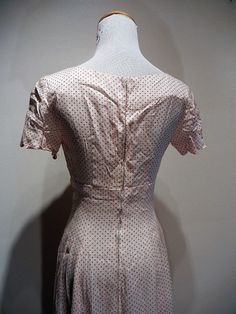 "The quintessential 1930 tea dress. Scalloped bust line and sleeves, fitted bodice, zip back, gorgeous framing of decollette, and a six gore bias cut flare to the skirt. Minor discoloration at edge of neckline in back. And how about those matching gloves that finish the look?! My mannequin has a 36 bust and 24\" waist. Length is 56\" from center neckline / collar to hem. It is fitting my mannequin as though it were made for her. The rib cage tapers to 26 under bust and to the waist to create the Party Dress Red, Vintage Tea Dress, Lawn Party, Paisley Fabric, Garden Lawn, Red Polka Dot, Tunic Shirt, Rib Cage, Red Dots