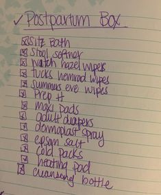 a note with writing on it that says postpartum box and other things to write