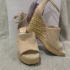 Beautiful Item, Never Worn. Brand New In Box From My Own Actual Closet! Braided Detail On Wedge Heel, Silver Trim On Inner Base Of Shoe, Inner Side Of Shoe Has Elastic Expansion Detail For Comfort. Beige Wedge Sandals With Stacked Heel And Round Toe, Casual Beige Wedge Sandals With Heel Strap, Beige Wedge Sandals With Stacked Heel For Spring, Spring Beige Wedge Sandals With Stacked Heel, Cream Block Heel Casual Wedge Sandals, Beige Suede Wedge Sandals, Casual Cream Wedge Sandals With Block Heel, Casual Cream Block Heel Wedge Sandals, Casual Natural Color Ankle Strap Heels