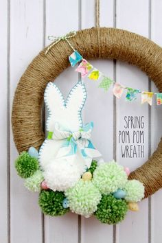 a spring wreath with an easter bunny on it