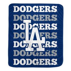 the los angeles dodgers baby blanket is shown in blue and white with silver letters on it