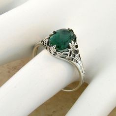 Vintage Estate Simulated Emerald Solitaire Filigree Ring. 925 Solid Sterling Silver. Stamped 925. Excellent Condition/Like New. Art Nouveau Sterling Silver Rings As A Gift, Art Nouveau Sterling Silver Rings As Gift, Art Nouveau Sterling Silver Gift Rings, Vintage Sterling Silver Emerald Ring As Gift, Handmade Classic Sterling Silver Emerald Ring, Sterling Silver Filigree Ring With Gemstone, Unique Sterling Silver Filigree Ring With Intricate Design, Elegant Engraved Round Emerald Ring, Unique Filigree Ring With Intricate Design For Anniversary