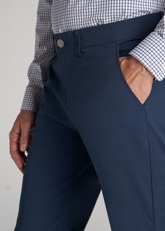 About Our Men's Tall Pants These extra-long chinos strike the perfect balance between classic and comfortable. They're designed to look like a pair of tapered chinos but are made of a lighter stretchy fabric that provides plenty of room for movement so you can tee off on the golf course, take the dog for a walk or grab dinner with friends at that new restaurant in town. We know how hard it is to find men's tall pants, which is why we made sure this pair had an extra-long inseam measured specific Business Casual Straight Chinos With Hip Pockets, Business Tapered Leg Chinos With Pockets, Business Casual Tapered Leg Chinos With Belt Loops, Tapered Leg Chino Cotton Twill Dress Pants With Pockets, Business Casual Chino Cotton Twill Trousers, Classic Chino Cotton Twill Pants With Hip Pockets, Business Casual Chinos With Hip Pockets, Classic Business Casual Work Pants With Hip Pockets, Classic Work Pants With Hip Pockets For Business Casual