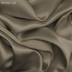 an image of a satin fabric that is very soft and shiny in the light gray color