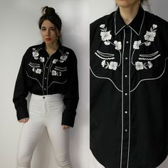 Vintage cowboy shirt 70s / Embroidered black shirt / Western Rodeo Floral Flowers embroidery shirt  Vintage cowboy shirt with stunning floral embroidery and pearl snaps. Size on the label: 43/44. Vintage size: please check the measurements to make sure it will fit you. Measurements, flat / approximate measurements: From armpit to armpit: 63 cm (24.80'') The length of the sleeve (measured from armpit): 51 cm (20.08'') Overall length (approx., longest part): 79 cm (31.10'') Material: polyester, cotton Good Vintage Condition with flaws (there is fixed areas/tears on the chest (close to decoration), few tiny holes close to the front snaps) . Look at all the photos for a more detailed description. Due to camera and your monitor settings colors may appear slightly different than they are in real Embroidered Button-up Western Tops, Western Style Embroidered Button-up Top, Black Top For Spring Rodeo, Spring Embroidered Tops For Rodeo, Black Button-up Top For Rodeo, Black Embroidered Western Top, Western Style Embroidered Summer Tops, Embroidered Western Tops For Summer, Black Shirt With Floral Embroidery For Fall