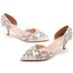 Details: Style: Gorgeous Embellishment: Rhinestone Heels Type: Stiletto Heel height: 5.5厘米 Closure Type: slip on Toe: Pointed Toe Upper Material: PU Leather Sole Material: Rubber Lining Material: PU Leather Crystal Wedding Shoes With Rhinestones, White Bedazzled Heels, Bedazzled White Wedding Shoes For Party, White Bedazzled Wedding Shoes For Party, Elegant Bedazzled White Wedding Shoes, Fitted White Wedding Shoes With Rhinestones, Elegant White Heels With Rhinestones, White Embellished Heels For Events, Elegant White Wedding Shoes With Rhinestones